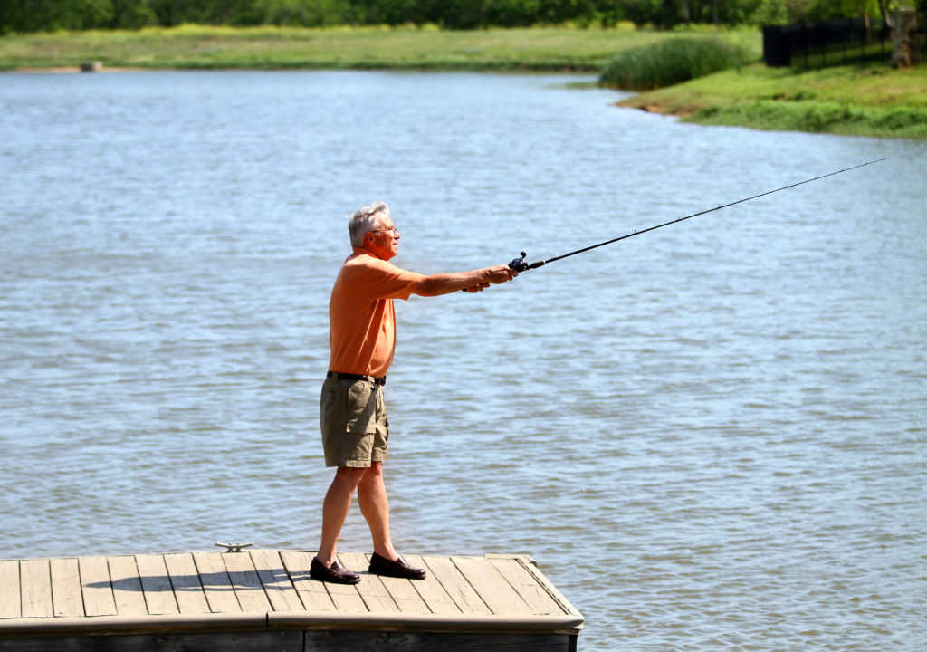 Man Fishing at Vaquero Club Fish Camp